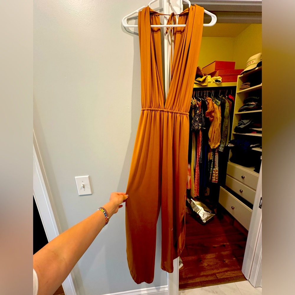 Beautiful romper - deep v in the front and back